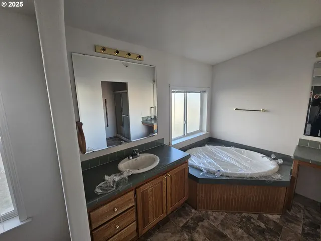 a view of front door and bedroom