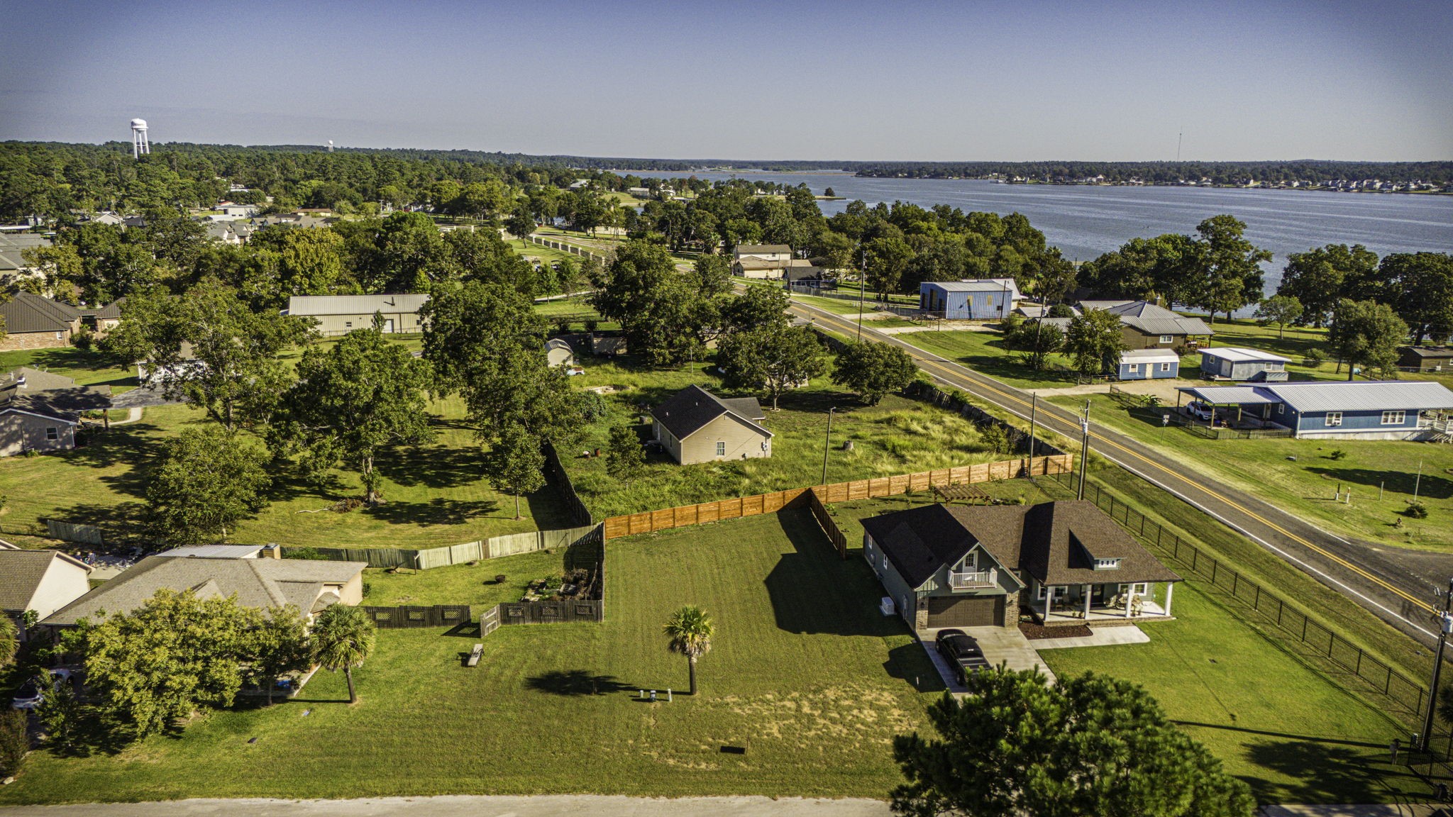 Lot 14 Treasure Point Onalaska, TX 77360 - Photo 20 of 27 an aerial view of residential houses with outdoor space
