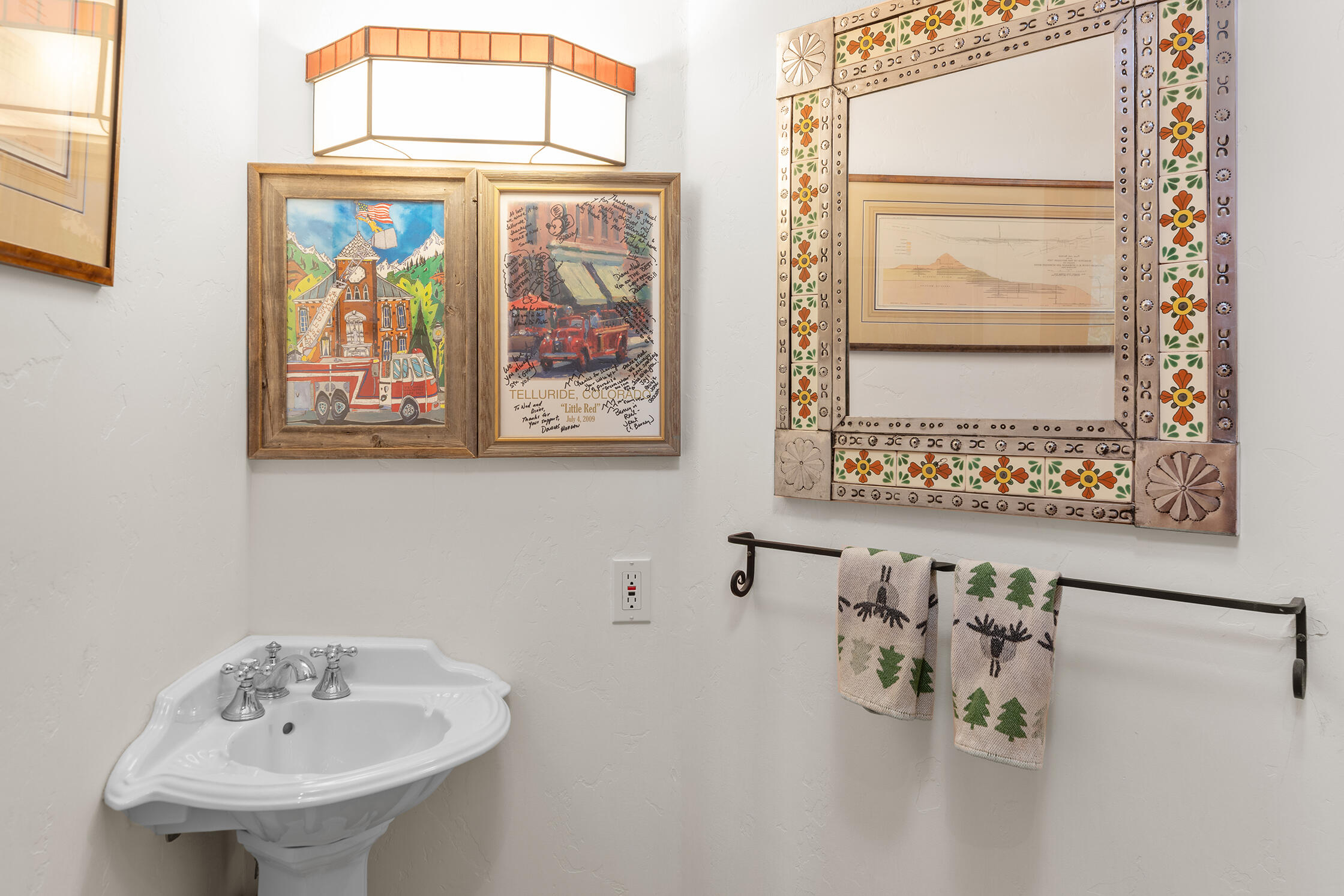 21 Royer Lane Telluride, CO 81435 - Photo 12 of 44 a bathroom with a sink and a mirror