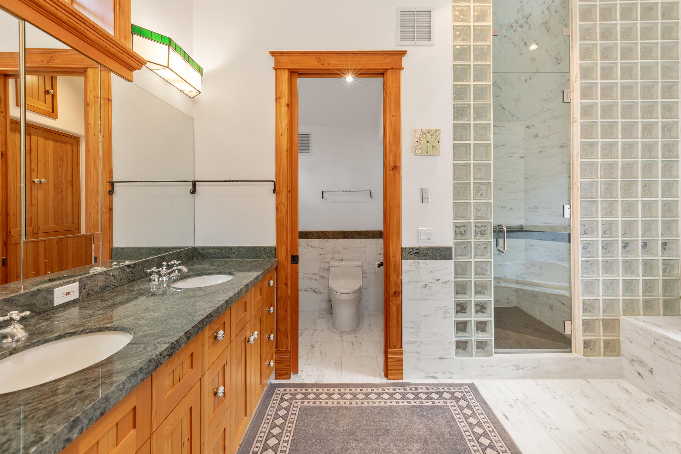 21 Royer Lane Telluride, CO 81435 - Photo 33 of 44 a bathroom with a granite countertop sink and a mirror