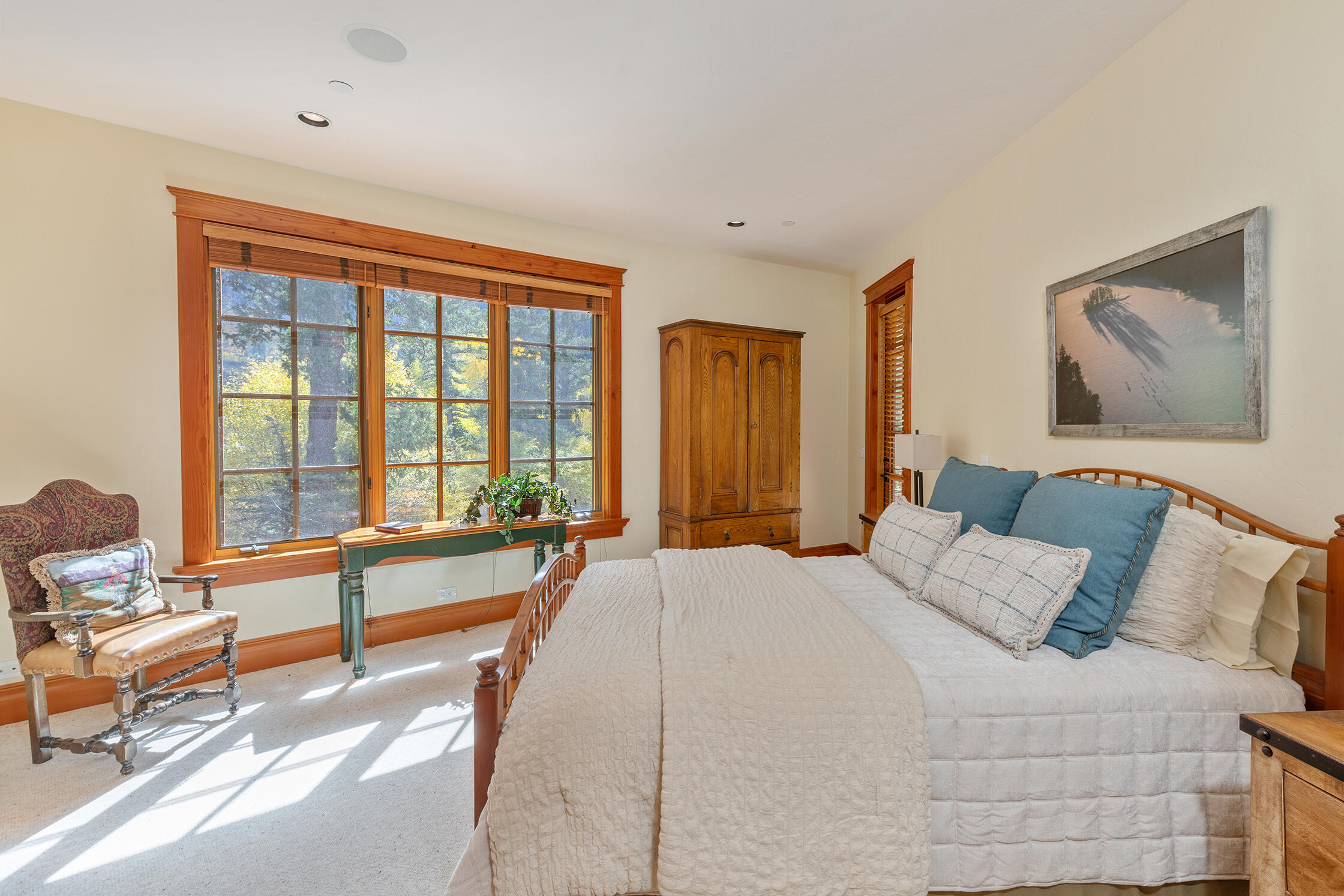21 Royer Lane Telluride, CO 81435 - Photo 39 of 44 a spacious bedroom with a large bed and a large window