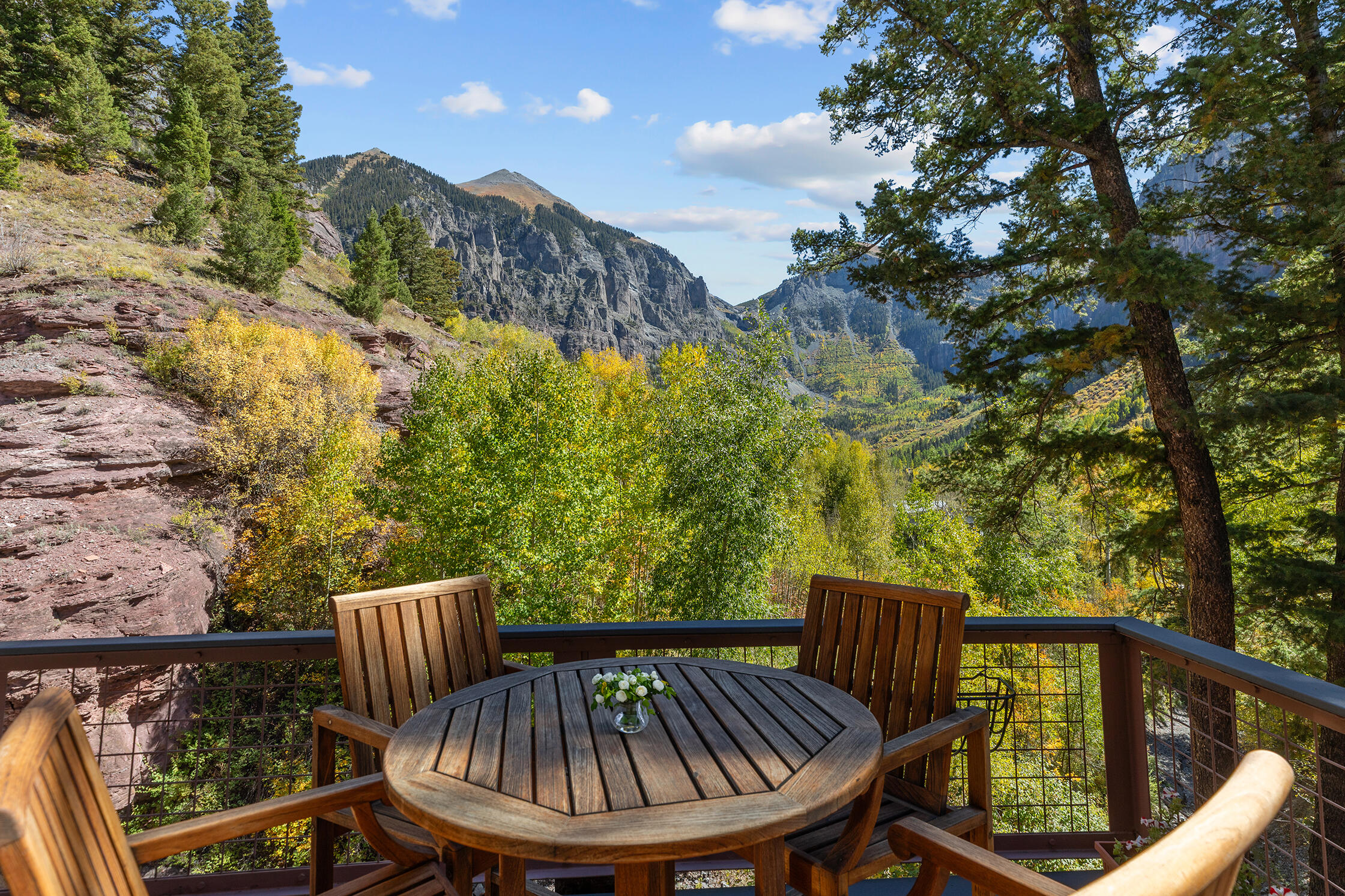 21 Royer Lane Telluride, CO 81435 - Photo 6 of 44 a view of balcony with furniture and trees