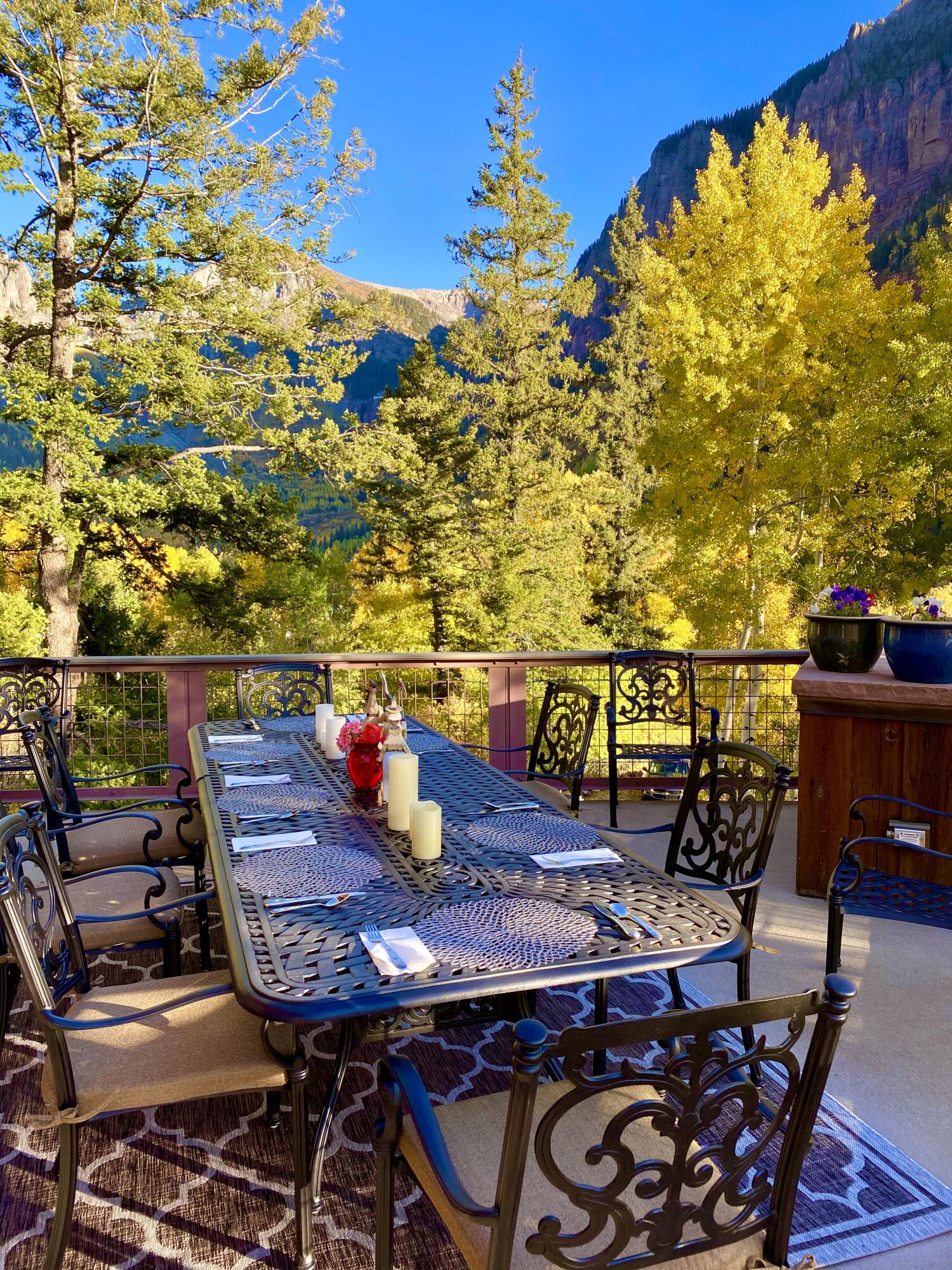 21 Royer Lane Telluride, CO 81435 - Photo 9 of 44 a view of a balcony with table and chairs