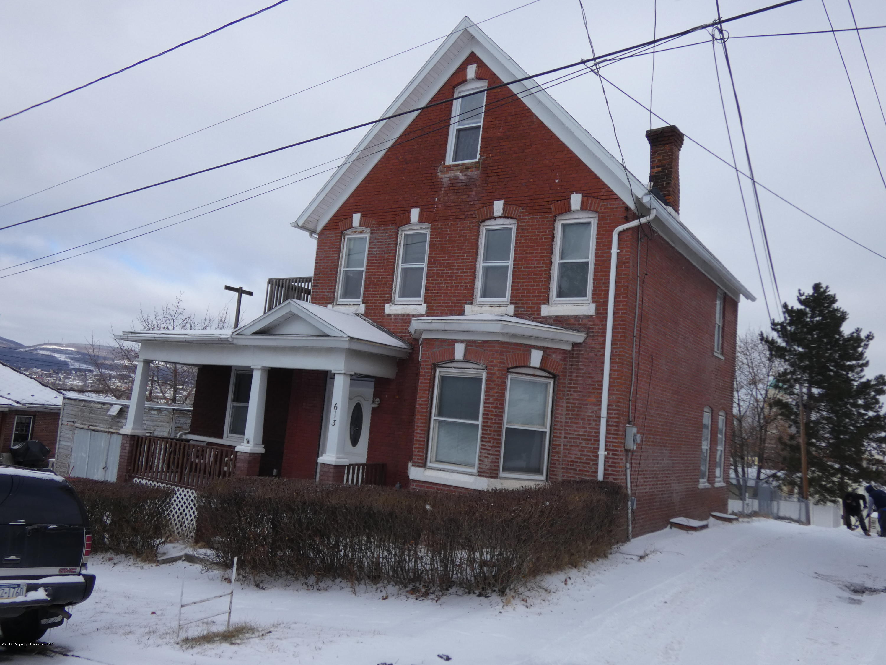 613 Fig Street Scranton, PA 18505 - Photo 36 of 36 a front view of a house with a yard