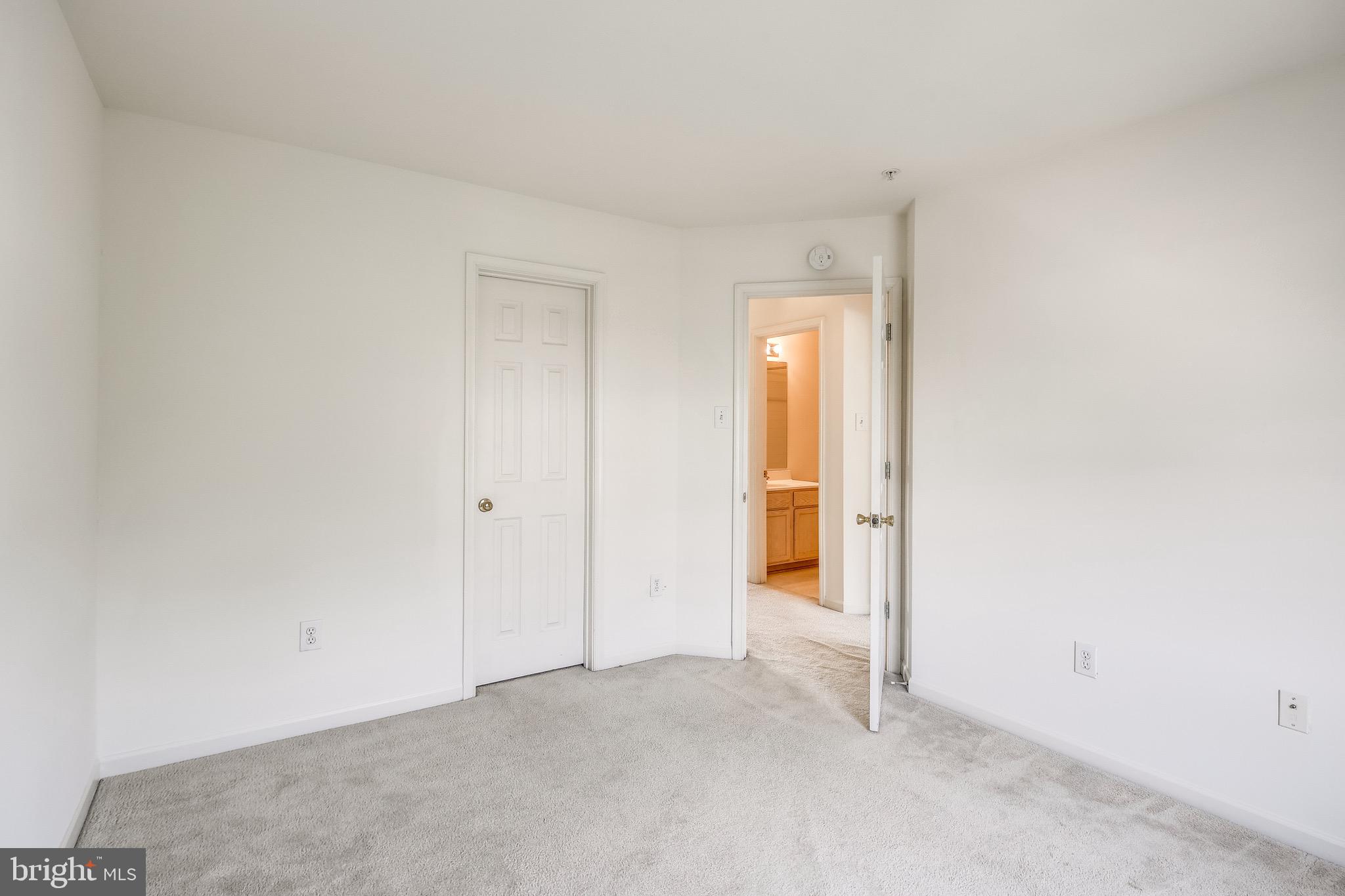 2702 Snowmill Court Ellicott City, MD 21043 - Photo 25 of 34 a view of an empty room and closet area