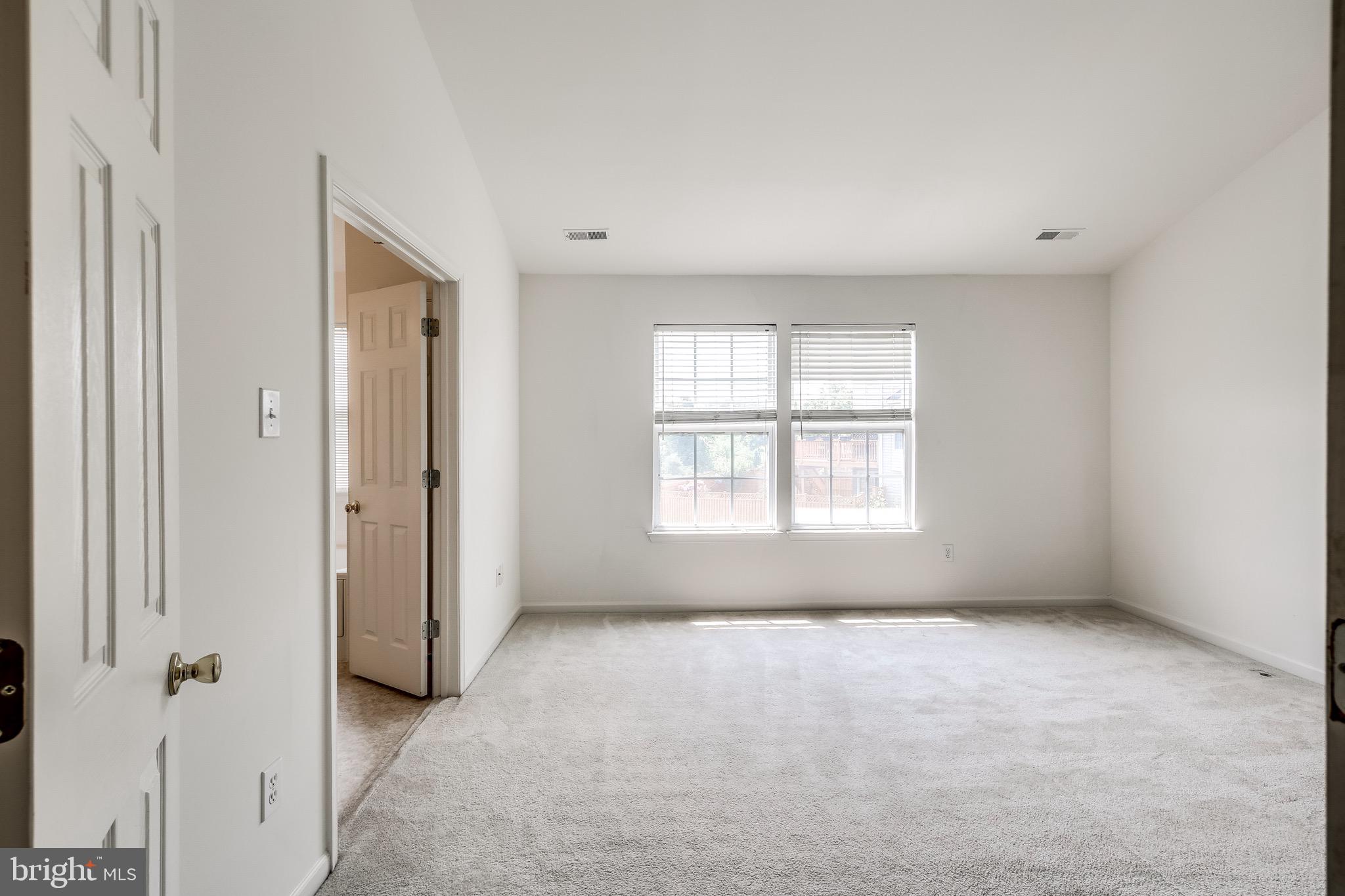 2702 Snowmill Court Ellicott City, MD 21043 - Photo 27 of 34 a view of an empty room with a window