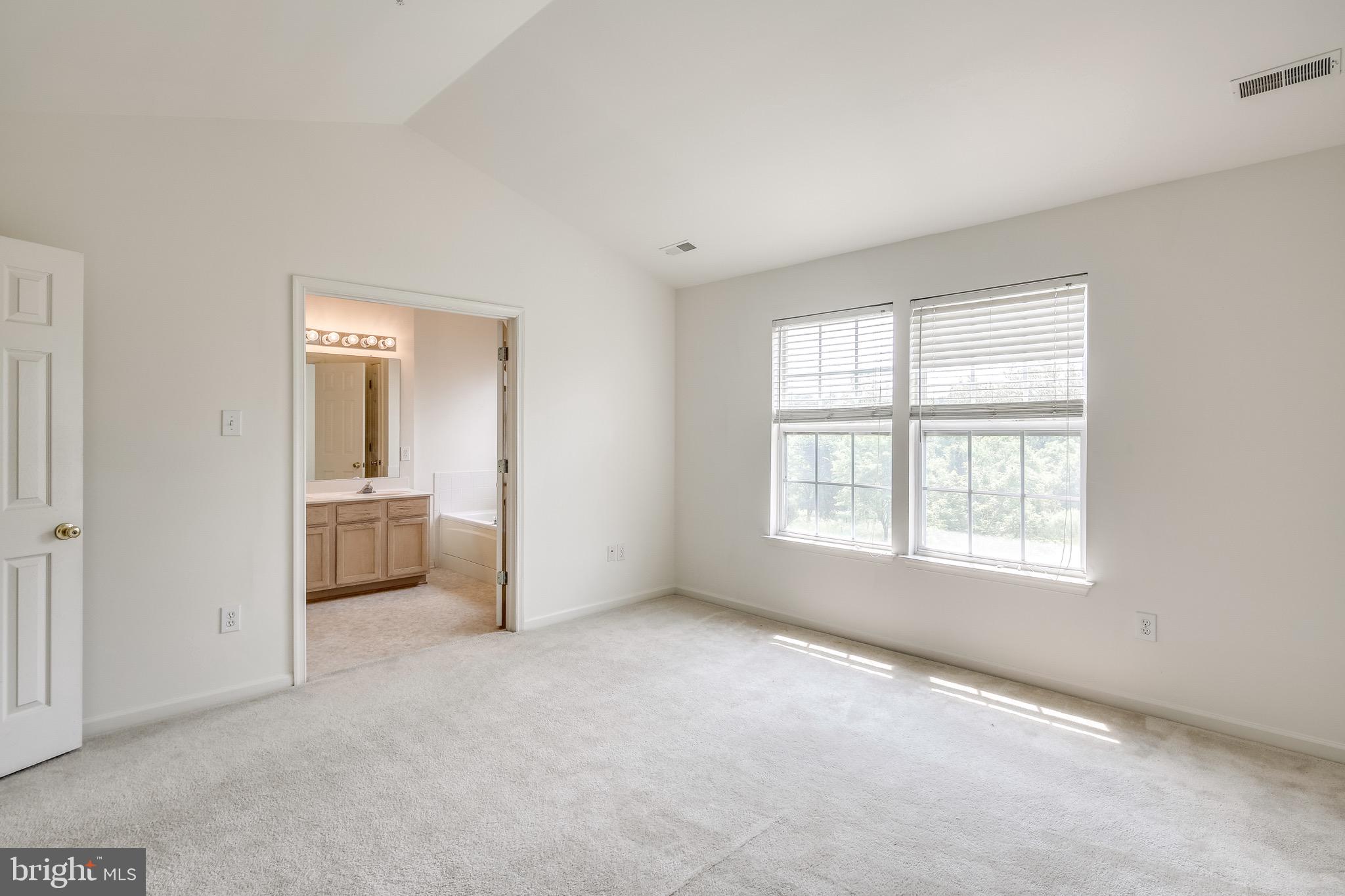2702 Snowmill Court Ellicott City, MD 21043 - Photo 29 of 34 wooden floor and windows in a room