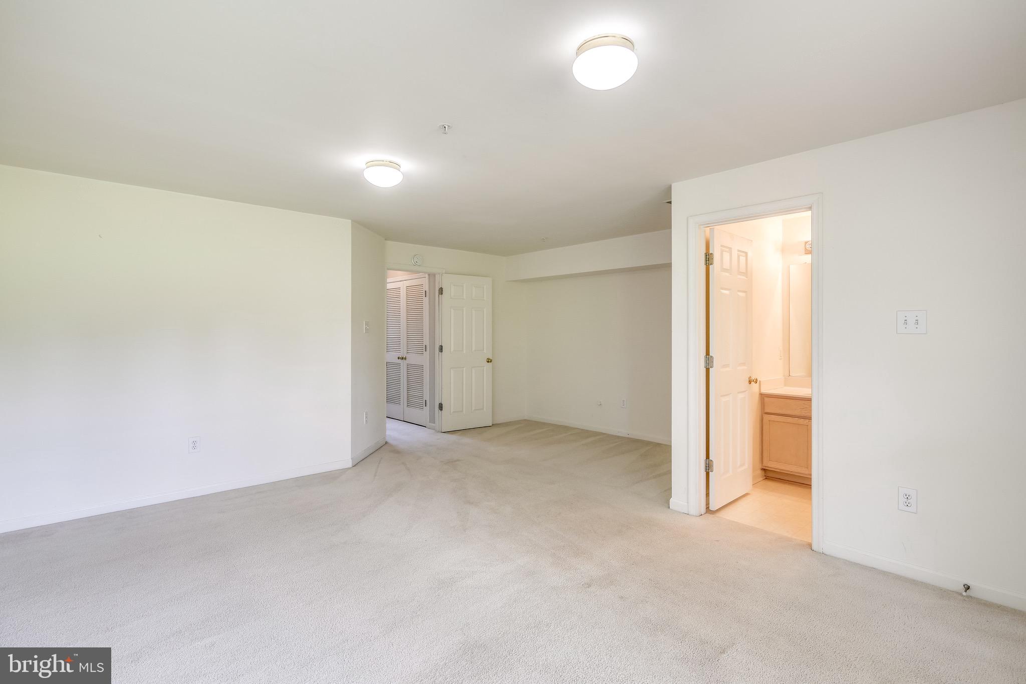 2702 Snowmill Court Ellicott City, MD 21043 - Photo 8 of 34 an empty room with an entryway