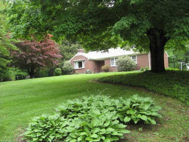 119 Talcott Hill Road Coventry, CT 06238 - Photo 1 of 1 a view of backyard with a garden and trees