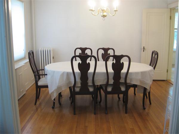 47 Algonquin Road Newton, MA 02467 - Photo 6 of 15 a view of a dining room with furniture and wooden floor