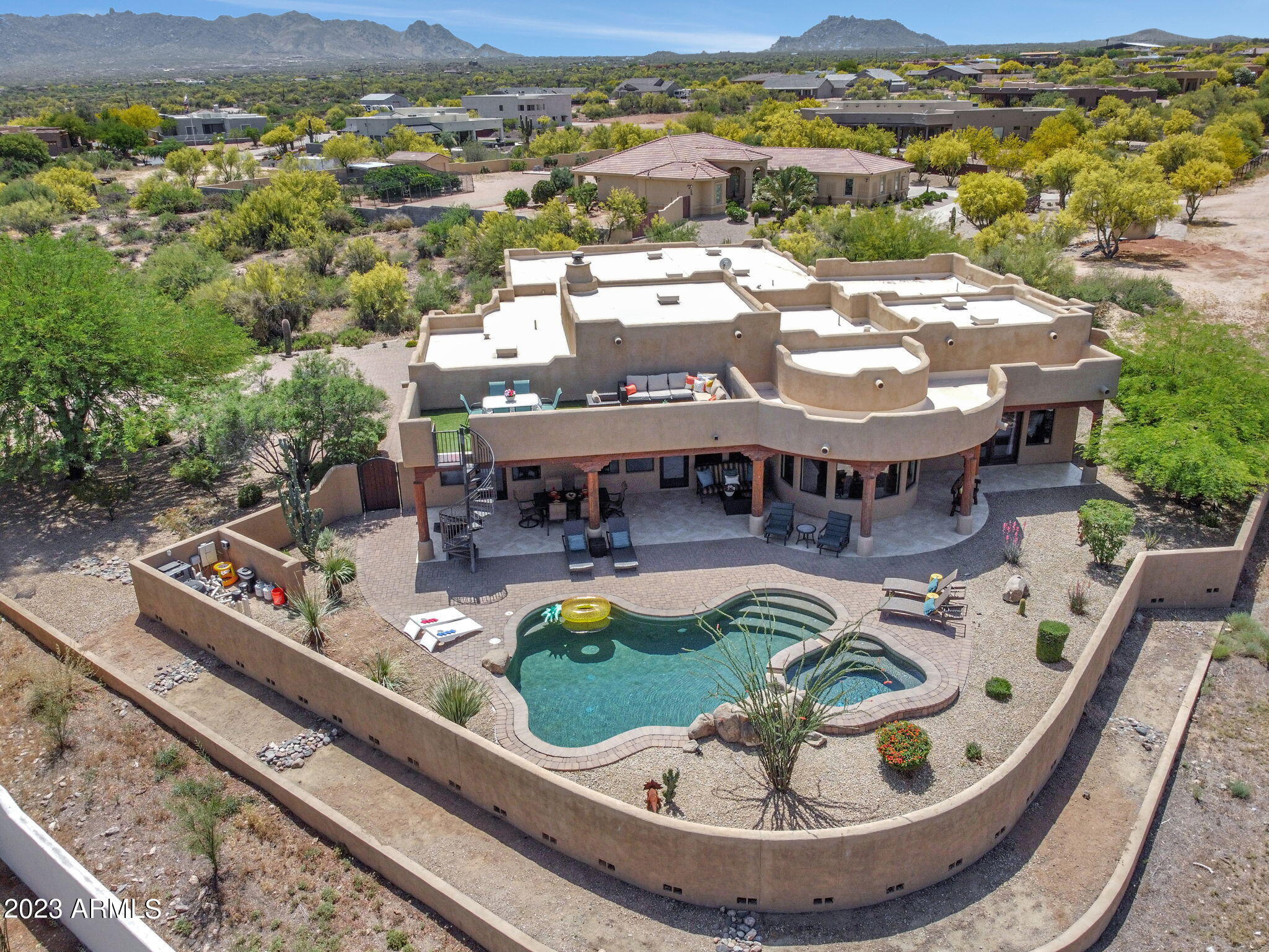 14214 East Gamble Lane Scottsdale, AZ 85262 - Photo 1 of 53 an aerial view of a house with swimming pool mountain view in back