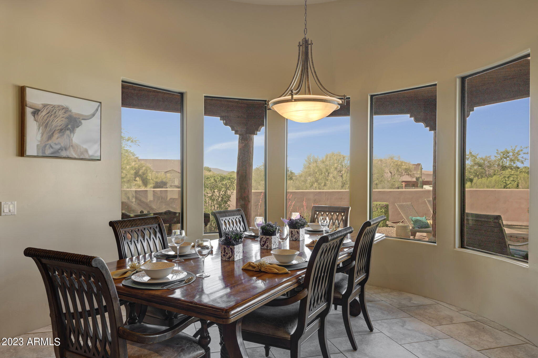 14214 East Gamble Lane Scottsdale, AZ 85262 - Photo 17 of 53 a view of a dining room with furniture window and outside view