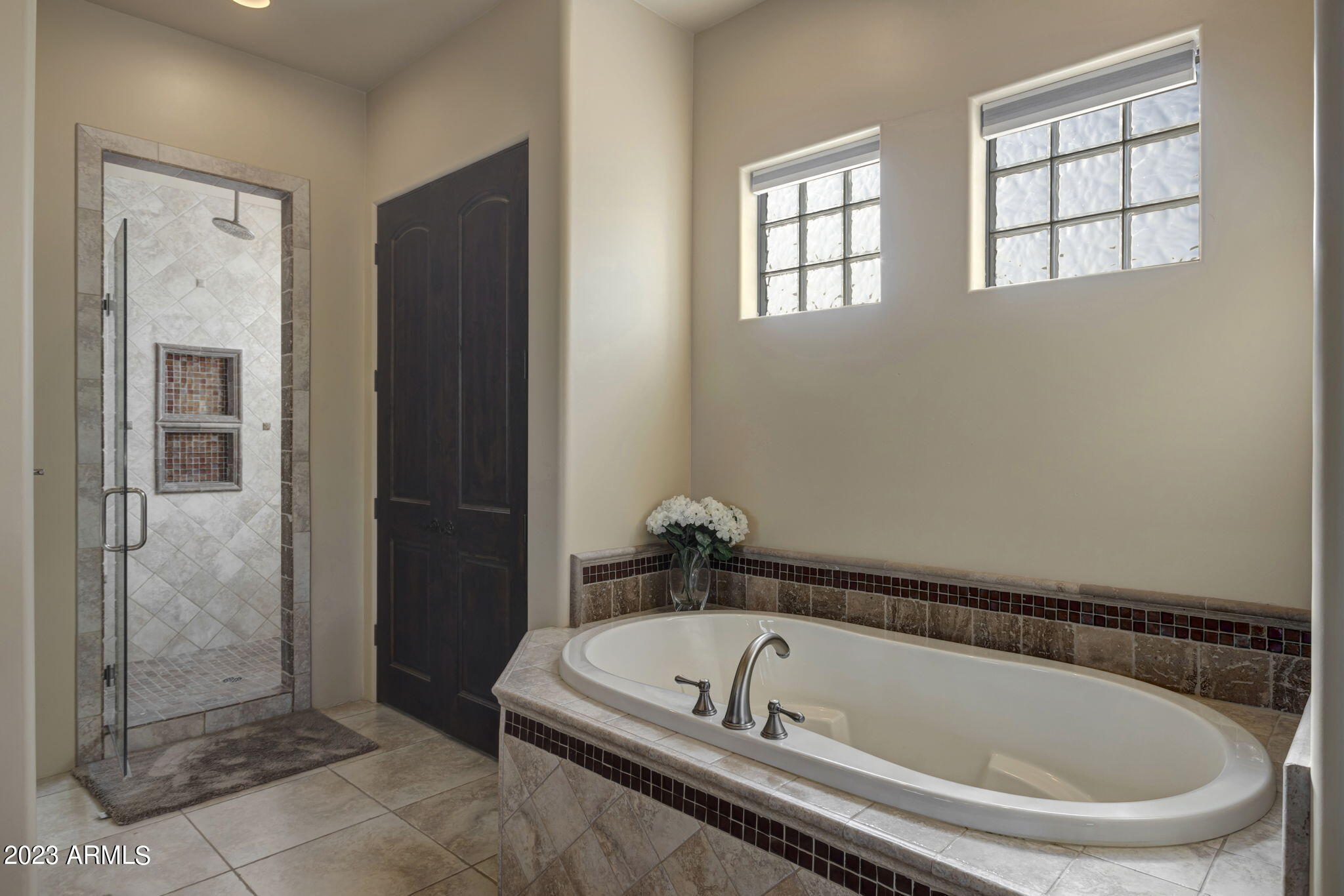 14214 East Gamble Lane Scottsdale, AZ 85262 - Photo 22 of 53 a bathroom with a tub and shower