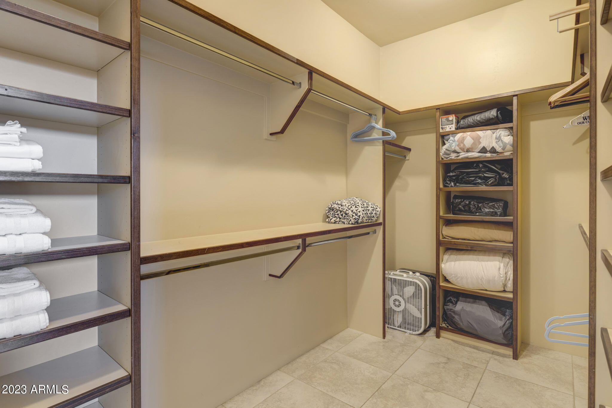 14214 East Gamble Lane Scottsdale, AZ 85262 - Photo 26 of 53 a view of walk in closet with empty racks