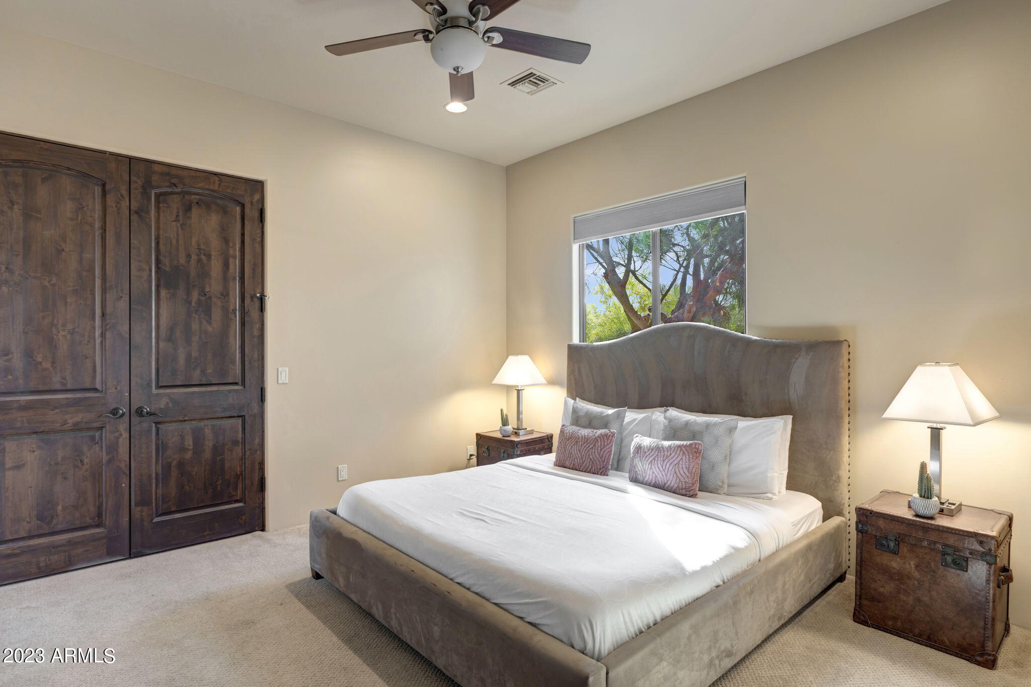 14214 East Gamble Lane Scottsdale, AZ 85262 - Photo 28 of 53 a bedroom with a bed and a painting on the wall