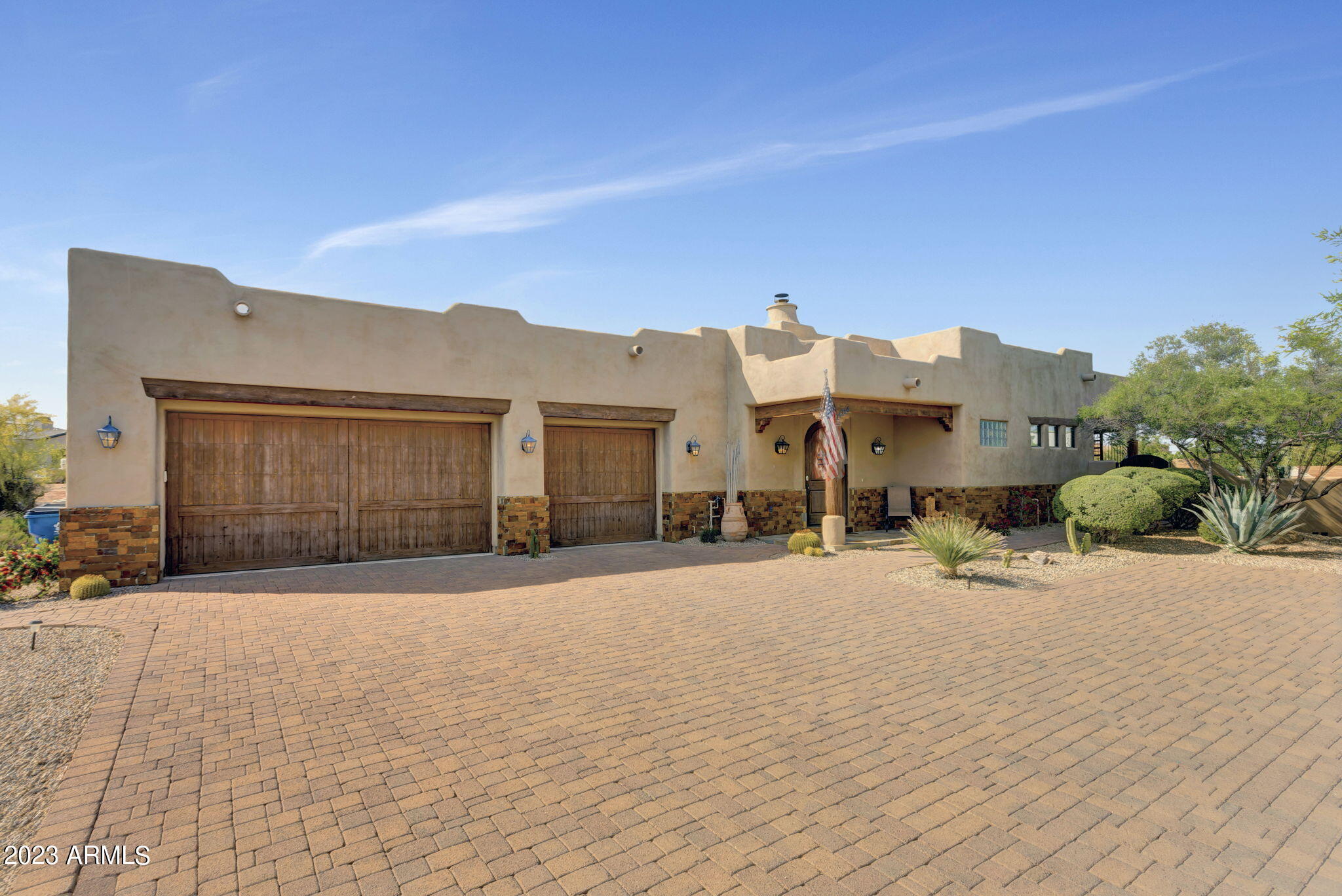 14214 East Gamble Lane Scottsdale, AZ 85262 - Photo 3 of 53 a front view of a house with a yard and garage