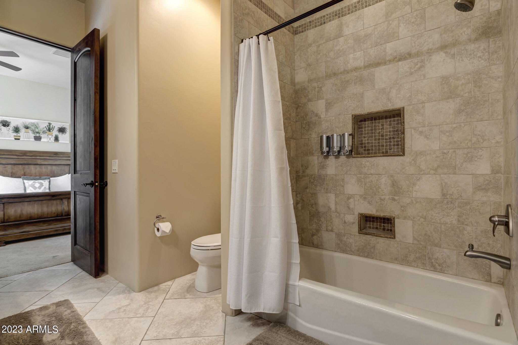 14214 East Gamble Lane Scottsdale, AZ 85262 - Photo 31 of 53 a bathroom with a granite countertop bathtub shower and toilet