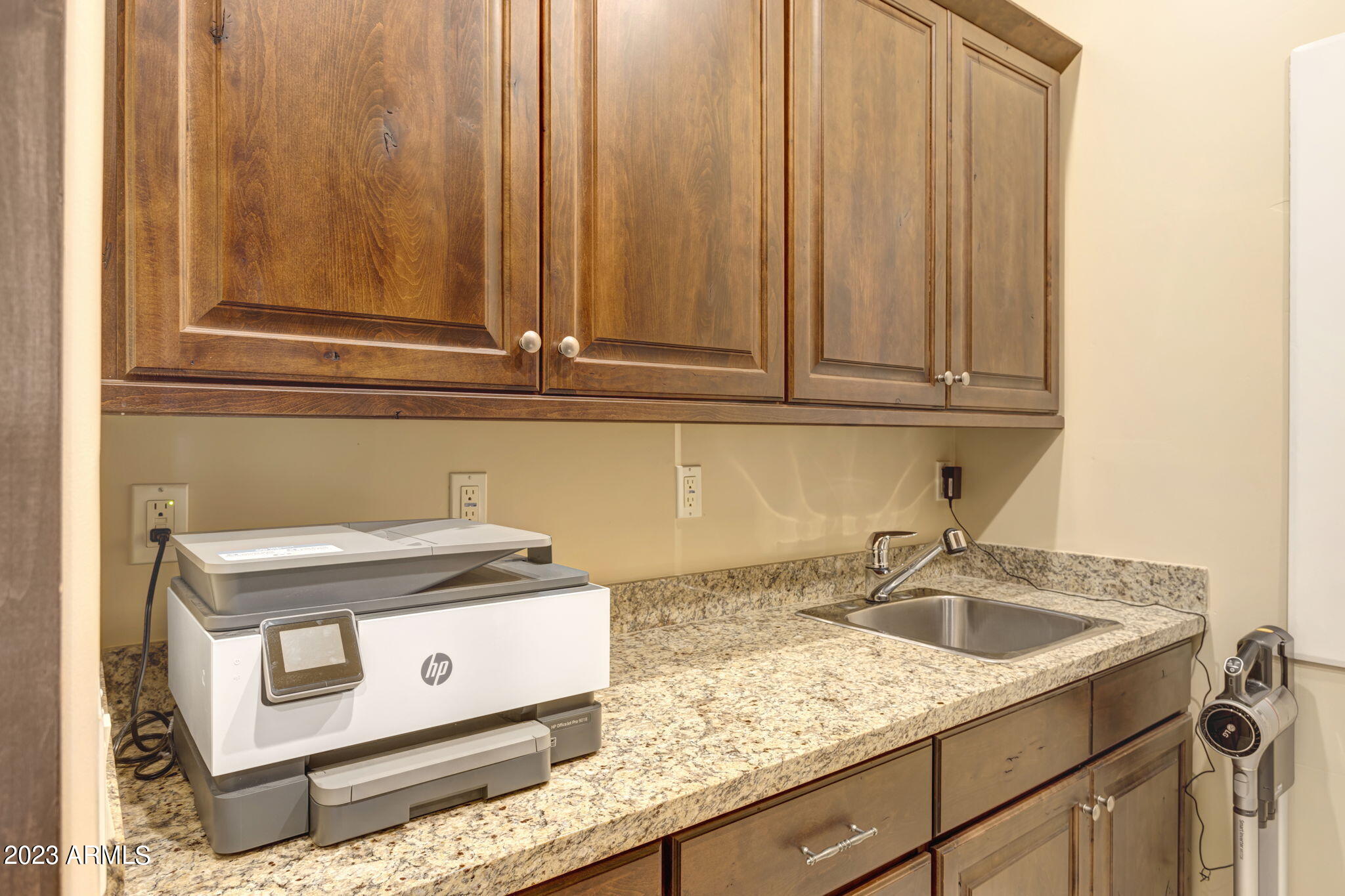 14214 East Gamble Lane Scottsdale, AZ 85262 - Photo 35 of 53 a kitchen with granite countertop a sink stove and cabinets