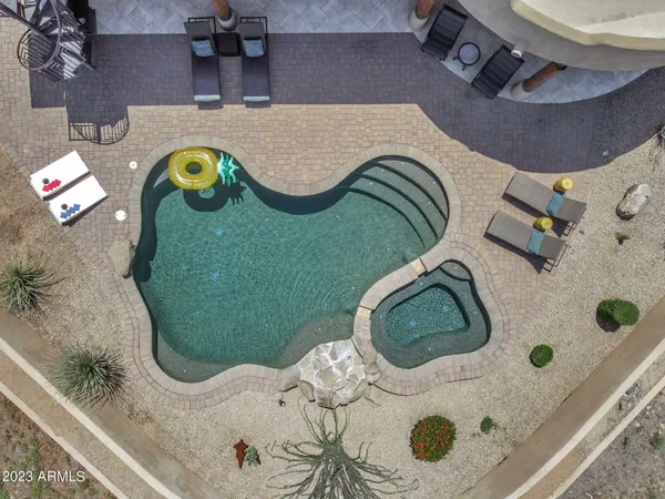 a view of a patio with furniture