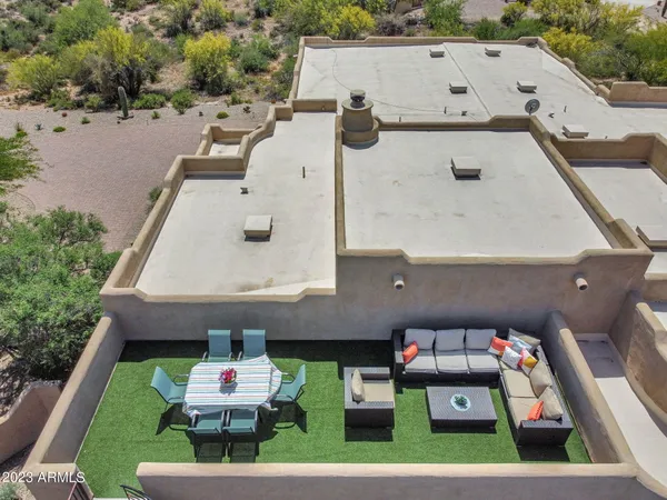 a view of a swimming pool with a patio