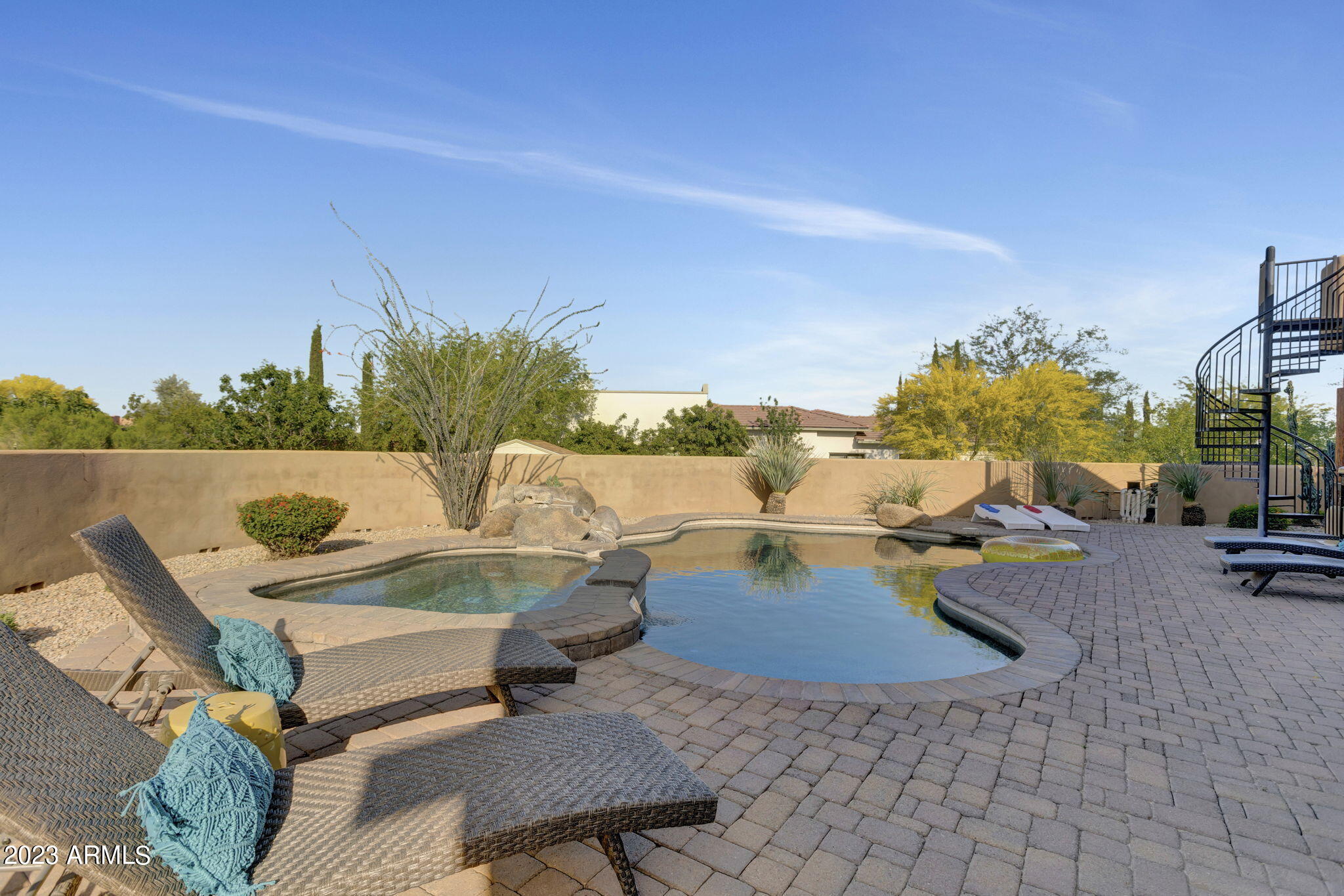 14214 East Gamble Lane Scottsdale, AZ 85262 - Photo 46 of 53 a view of a swimming pool with lounge chairs