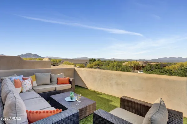 a view of balcony with seating space