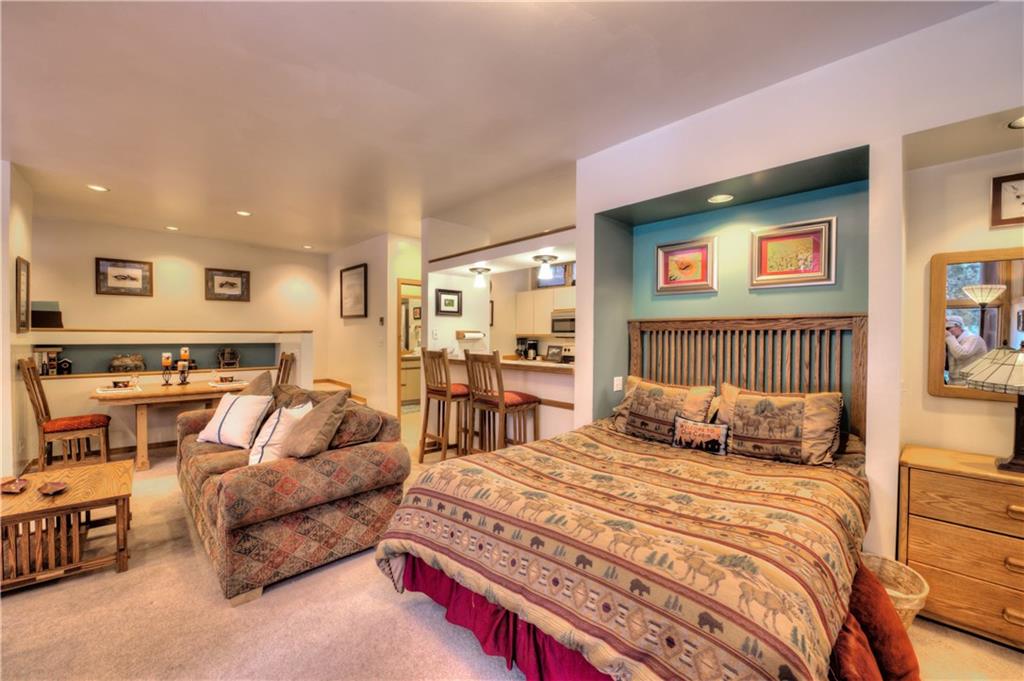 2017 Soda Ridge Road, Unit 1943 Keystone, CO 80435 - Photo 5 of 21 a bedroom with a bed and a couch