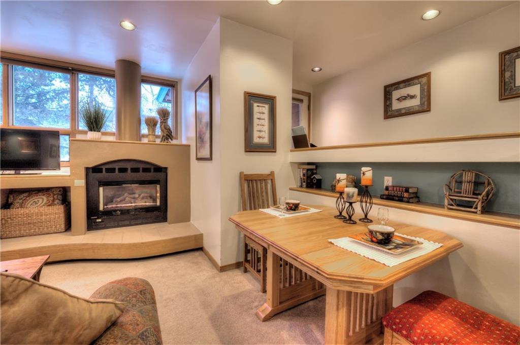 2017 Soda Ridge Road, Unit 1943 Keystone, CO 80435 - Photo 10 of 21 a living room with furniture and a fireplace