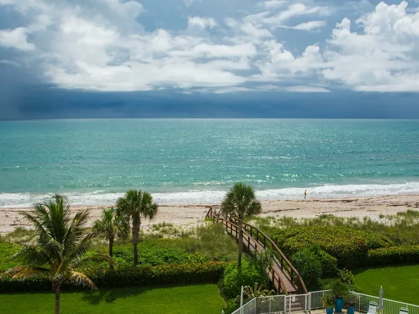a view of a lake with a yard