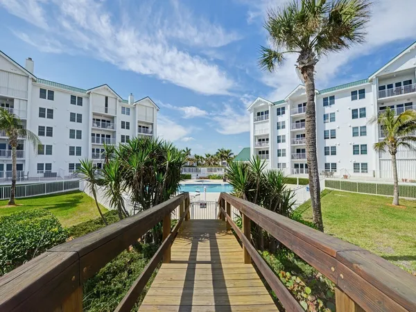 a view of balcony with a yard