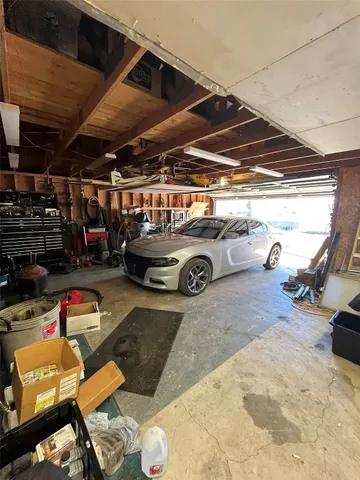 a front view of a house with a garage
