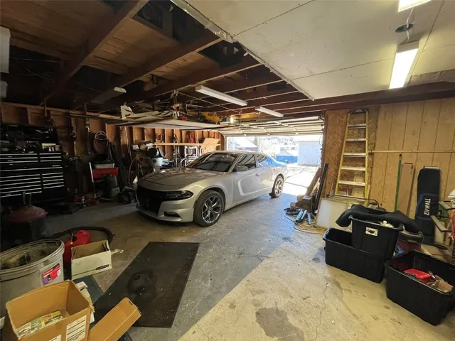 a front view of a house with a garage