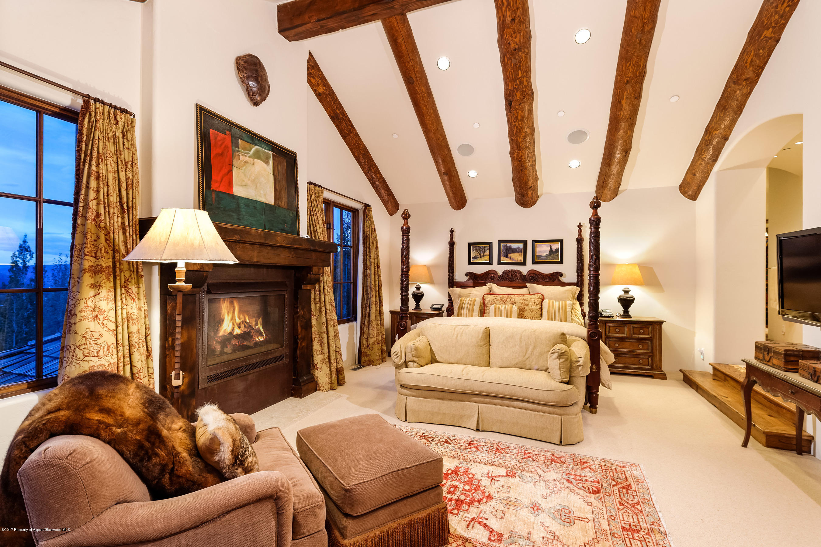 127 Powderbowl Trail Aspen, CO 81611 - Photo 13 of 31 a living room with furniture and a fireplace