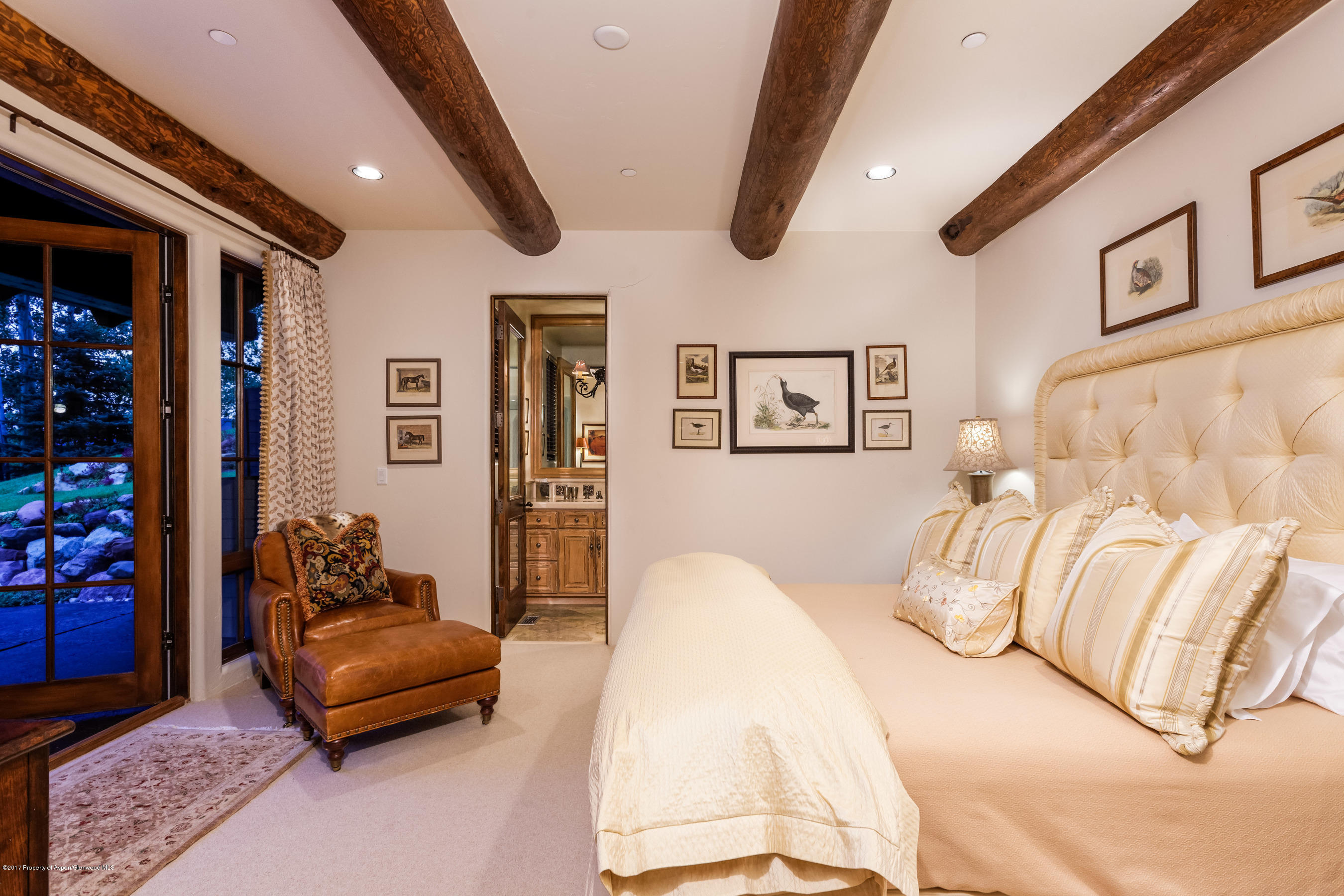 127 Powderbowl Trail Aspen, CO 81611 - Photo 14 of 31 a bedroom with furniture and balcony