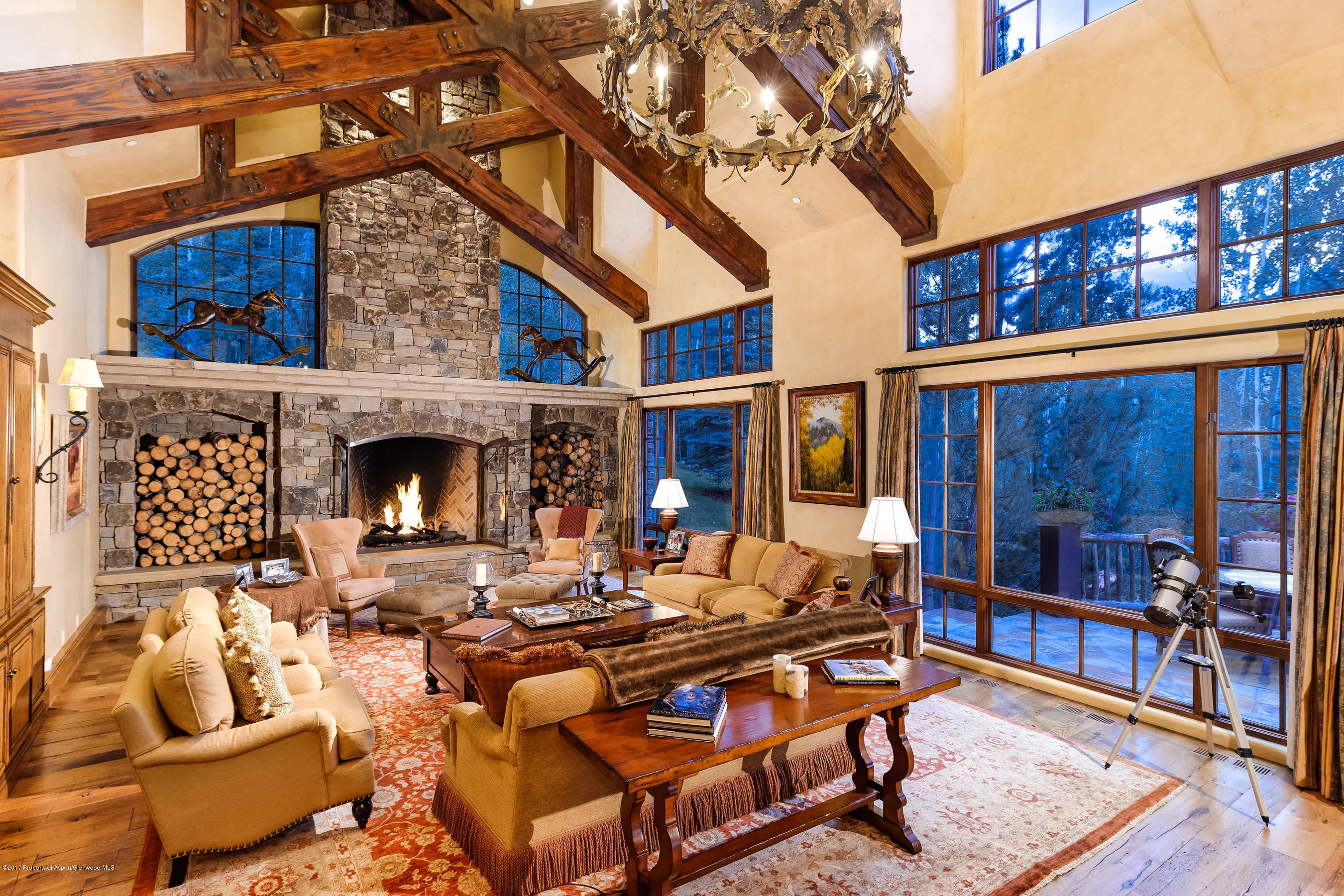 127 Powderbowl Trail Aspen, CO 81611 - Photo 2 of 31 a building outdoor space with patio furniture and potted plants