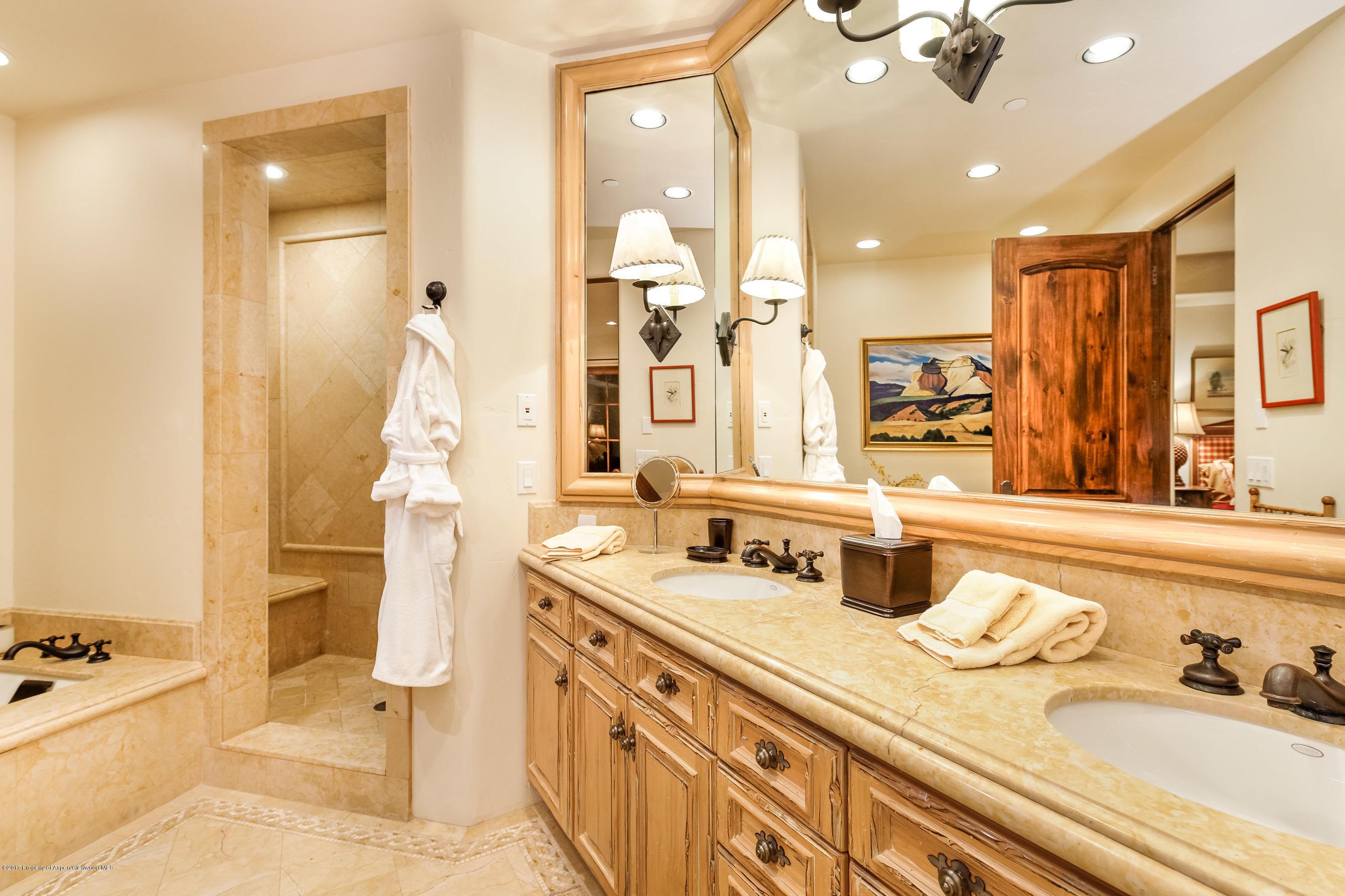 127 Powderbowl Trail Aspen, CO 81611 - Photo 26 of 31 a bathroom with a granite countertop sink mirror and