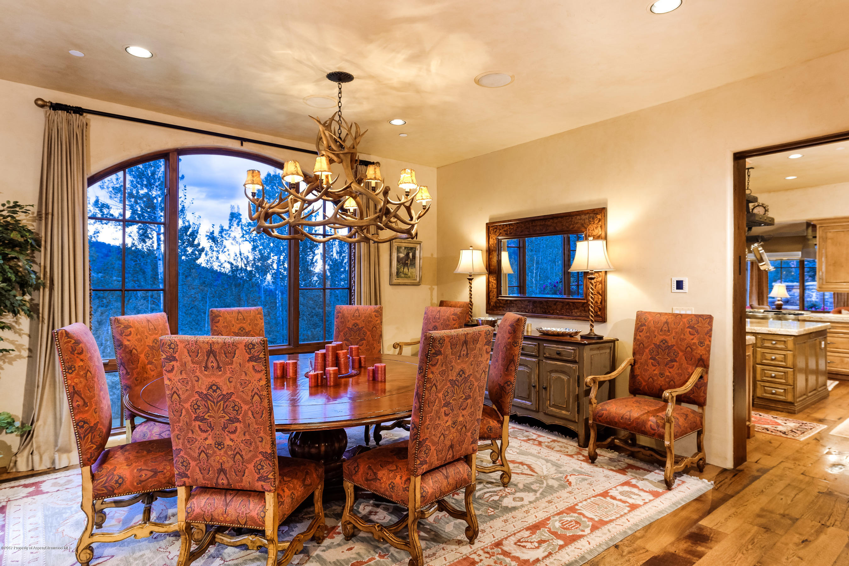 127 Powderbowl Trail Aspen, CO 81611 - Photo 3 of 31 a view of a dining room with furniture and chandelier
