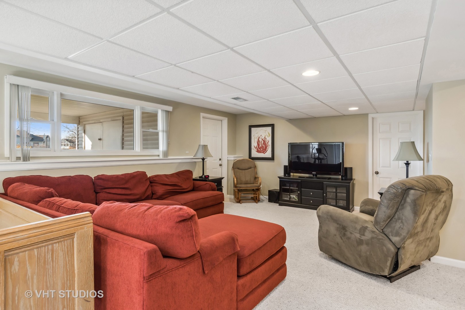 13344 Round Barn Road Plainfield, IL 60585 - Photo 15 of 24 a living room with furniture and a flat screen tv