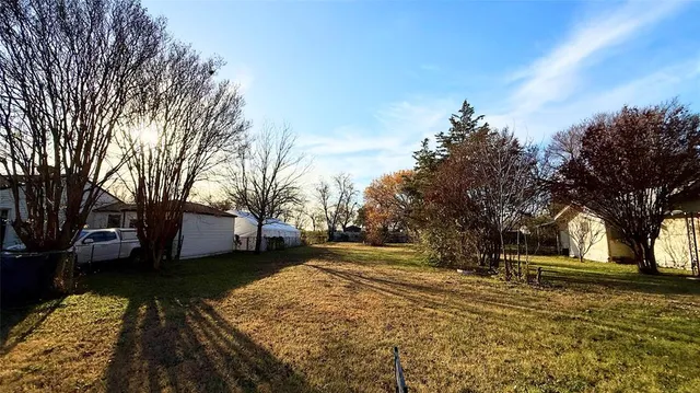 a view of road with trees