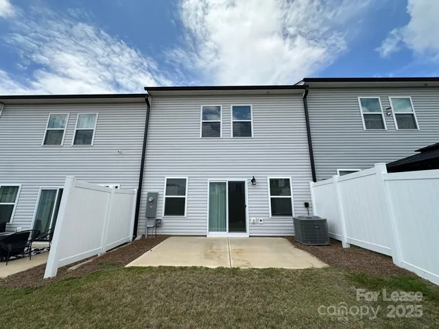 a house view with a backyard space