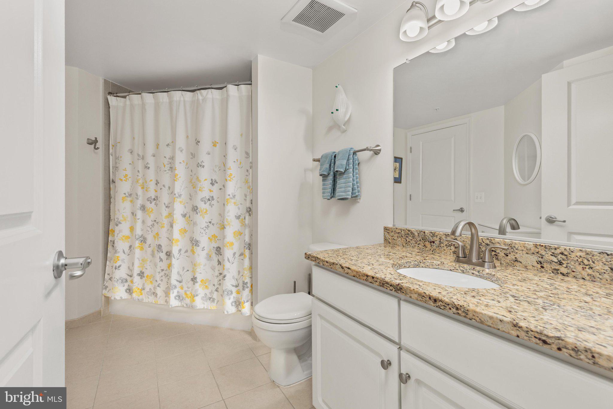 11800 Sunset Hills Road, Unit 815 Reston, VA 20190 - Photo 23 of 61 Ceramic Tile Flooring + Granite Countertops in BAs