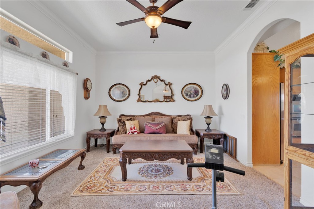 8482 Tumbleweed Road Phelan, CA 92371 - Photo 7 of 61 a living room with furniture and a window