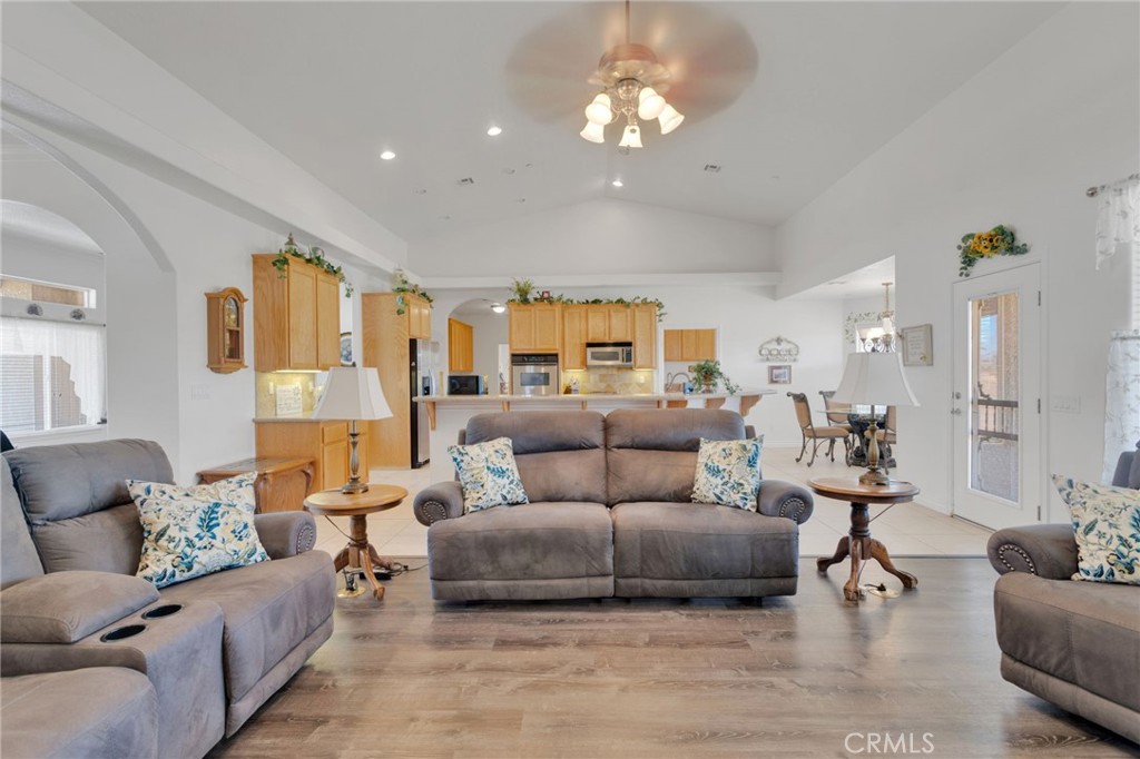8482 Tumbleweed Road Phelan, CA 92371 - Photo 9 of 61 a living room with furniture and wooden floor