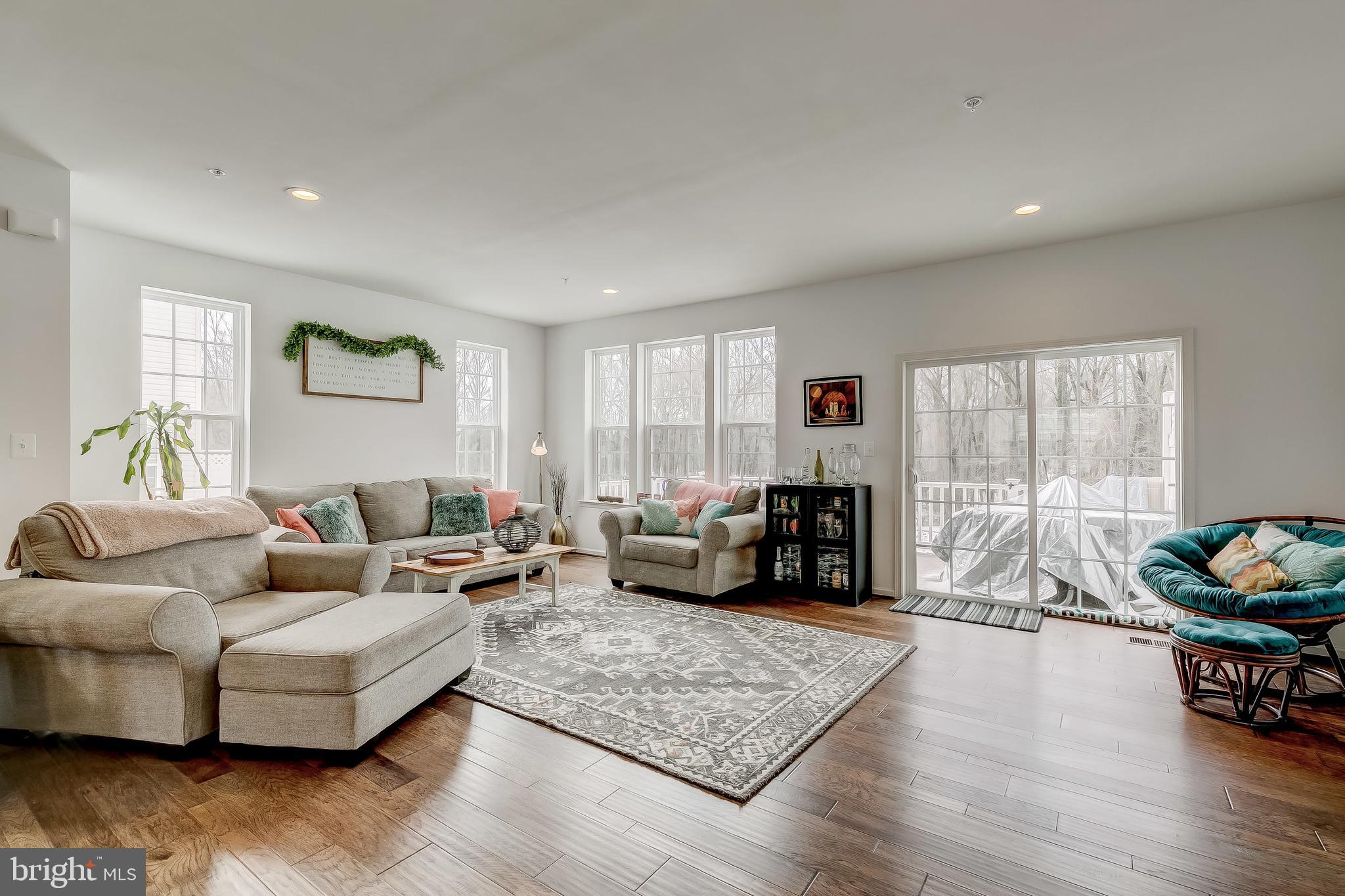 912 Morgan Run Road Baltimore, MD 21220 - Photo 11 of 37 Open Concept Living Room with Sliders to the Deck