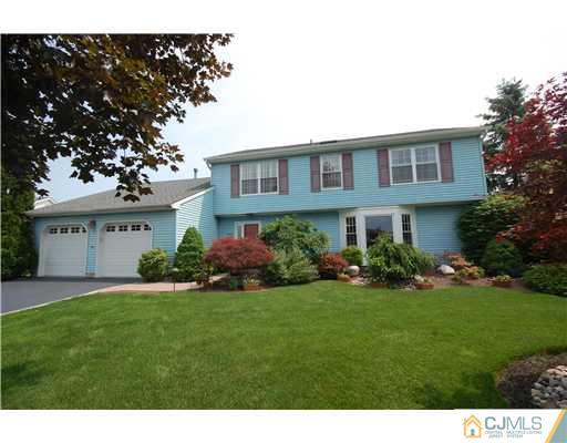 36 Higgins Road Old Bridge, NJ 08857 - Photo 1 of 12 a front view of a house with a yard