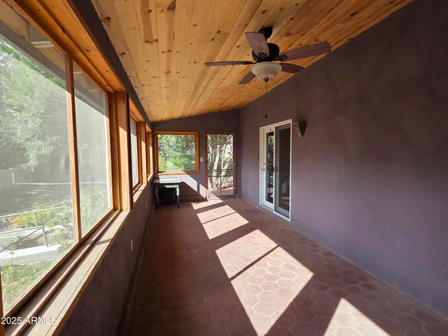 a view of a room with a large window