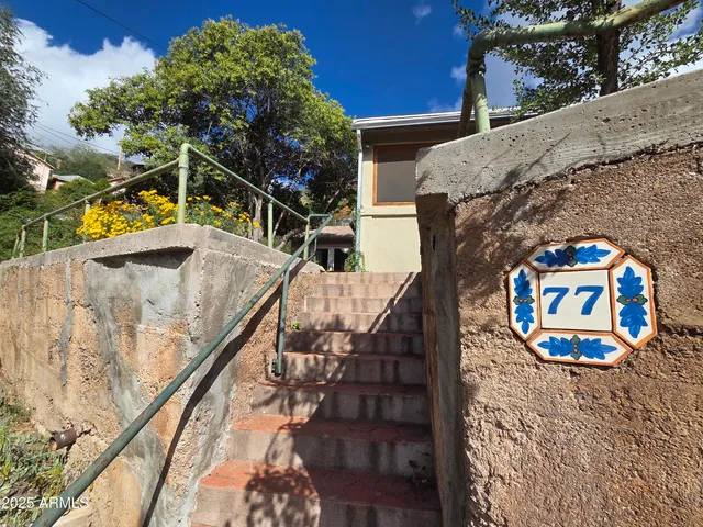 a view of staircase with outdoor seating