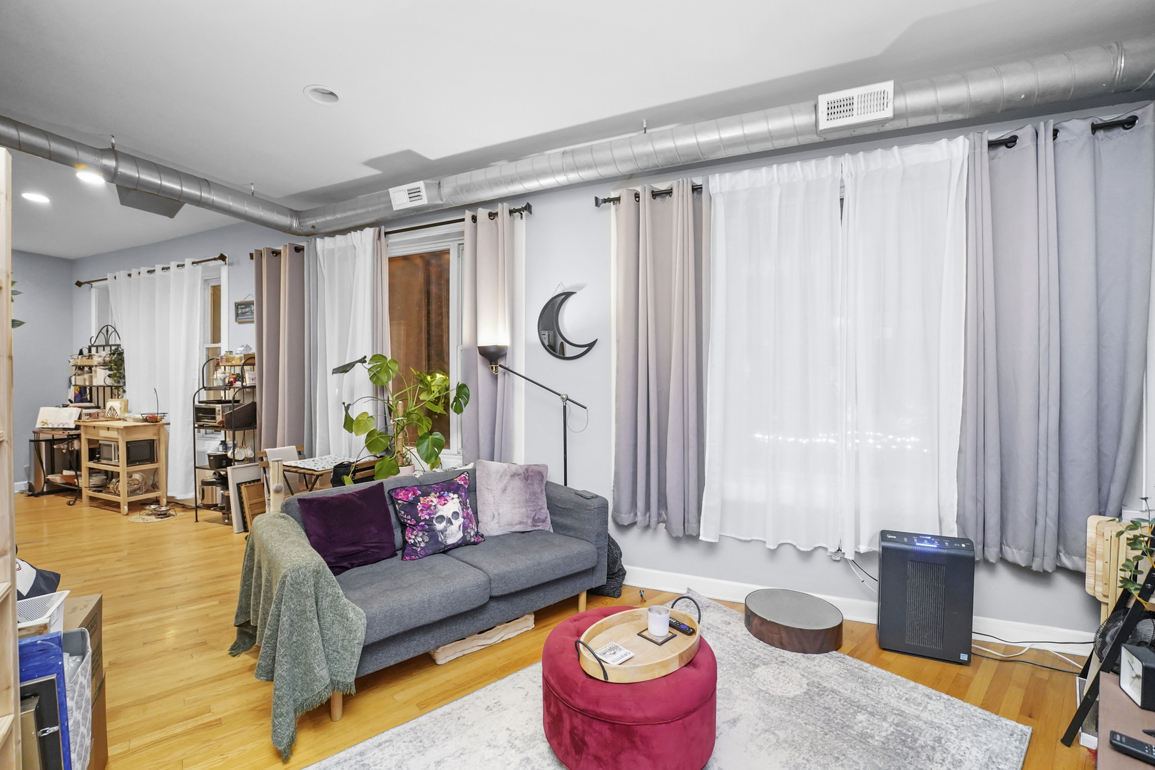 4363 North Lincoln Avenue Chicago, IL 60618 - Photo 12 of 34 a living room with furniture and a large window