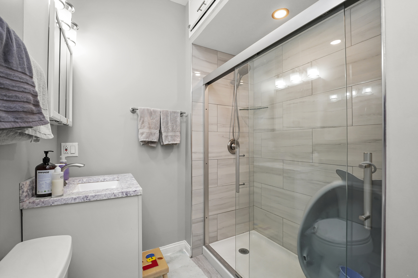 4363 North Lincoln Avenue Chicago, IL 60618 - Photo 13 of 34 a bathroom with a sink toilet and shower