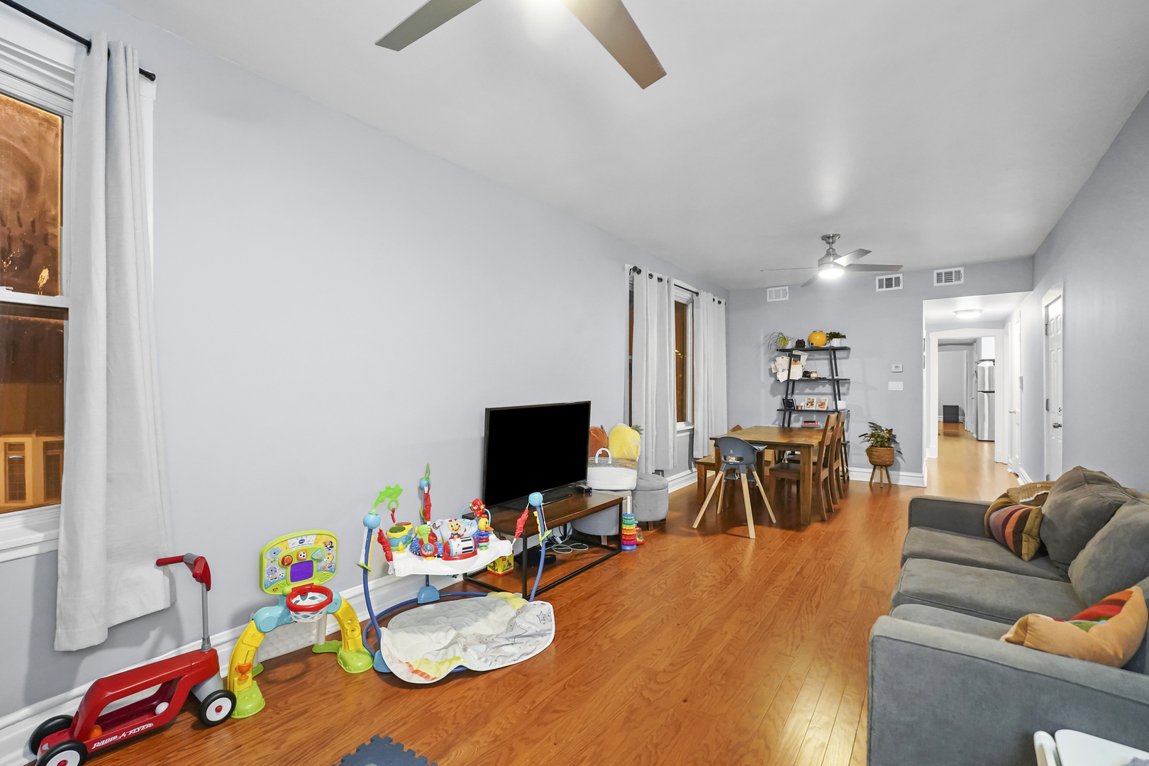 4363 North Lincoln Avenue Chicago, IL 60618 - Photo 28 of 34 a playing room with furniture and a flat screen tv